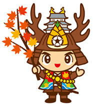 右手に紅葉したもみじの葉つきの枝をもっている大多喜町のキャラクターおたっきーのイラスト