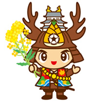 右手に菜の花を持っている大多喜町のキャラクターおたっきーのイラスト
